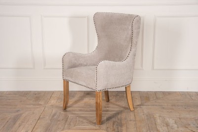 light grey upholstered carver chair